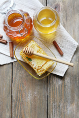 Wall Mural - Fresh honey on wooden table