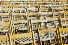Background With Many Wooden Chairs Lined