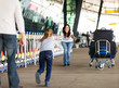 © michaeljung - young girl running to her mother at airport