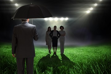 Aufkleber - Composite image of mature businessman holding an umbrella