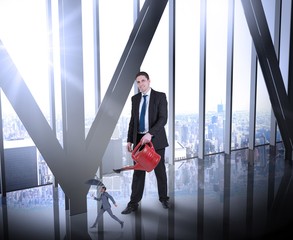 Aufkleber - Composite image of businessman watering tiny businessman