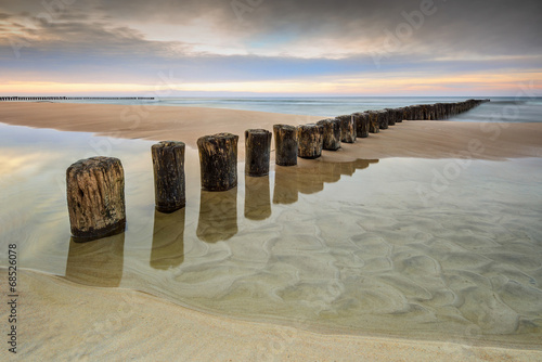 Wschód słońca na plaży Canvas