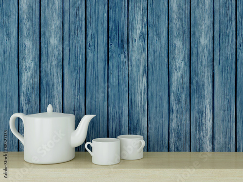 Board z aluminiowym obramowaniem Ceramiczne naczynia kuchenne na półce.