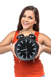 portrait of young woman holding clock.