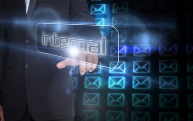 Aufkleber - Businessman pointing to word internal
