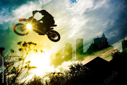 Fototapeta na wymiar Urban Dirt Bike Jump