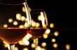 © MoustacheGirl - 2 Red wine glasses. Christmas romantic dinner image.
