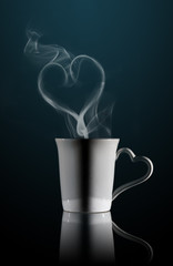 Canvas Print - White cup of coffee with a dense smoke 