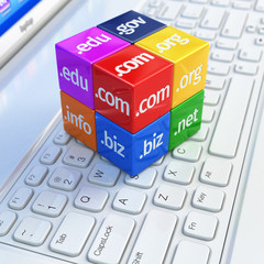 Poster - Domain concept. Cubes on white laptop keyboard.