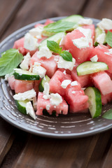 Wall Mural - Salad with watermelon, cucumber and feta cheese, vertical shot