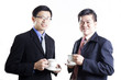 © kungverylucky - Two Businessmans talkimg and drink the coffee