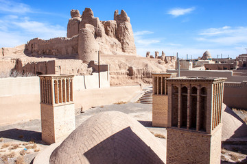 Water cistern and The Castle of Narenj in desert town Naein