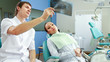 © shefkate - Young woman with dentist in a dental surgery. Healthcare