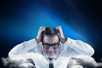 Poster - Composite image of stressed businessman touching his head