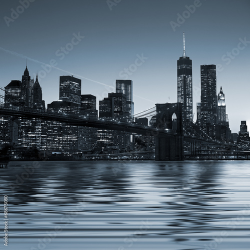 Obraz w ramie Panoramic view New York City Manhattan downtown skyline at night