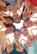 © Syda Productions - group of smiling teenagers showing victory sign