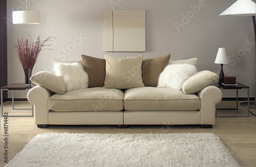 Fotografía cream sofa in modern living room with rug
