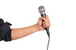 Male hand holding microphone