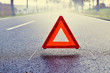 Bad Weather Driving - Warning Triangle on a Misty Road