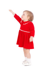 Pretty little girl in a red short dress isolated on white backgr