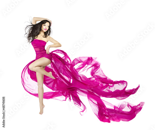 Fototapeta na wymiar Woman dancing in fluttering dress, fashion model dancer