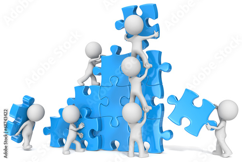 Fotografia Teamwork. The dude x 7 building large puzzle. Blue.