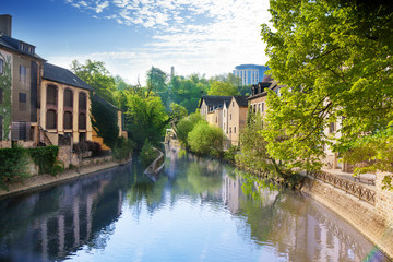 Wall Mural - Houses reflecting in Alzette river, Luxembourg