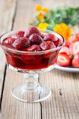 Sticker - Strawberry jam in glass jar on wooden table