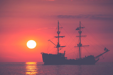 Boat on the sea at sunset in Baltic Sea, Poland.