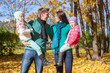 © travnikovstudio - Happy family of four on autumn day