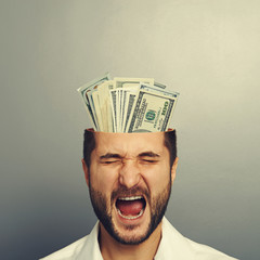 Wall Mural - screaming businessman with money