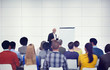 © Rawpixel.com - Businessman Presenting in Front of Audience
