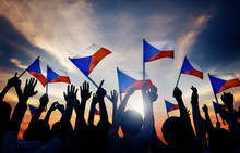 Silhouettes Of People Holding Flag Of Czech Republic