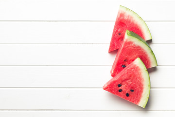 Wall Mural - sliced watermelon on kitchen table