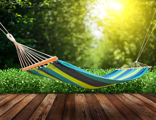 Wall Mural - Relaxing on hammock in garden