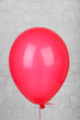 © Africa Studio - Color balloon on grey wall background