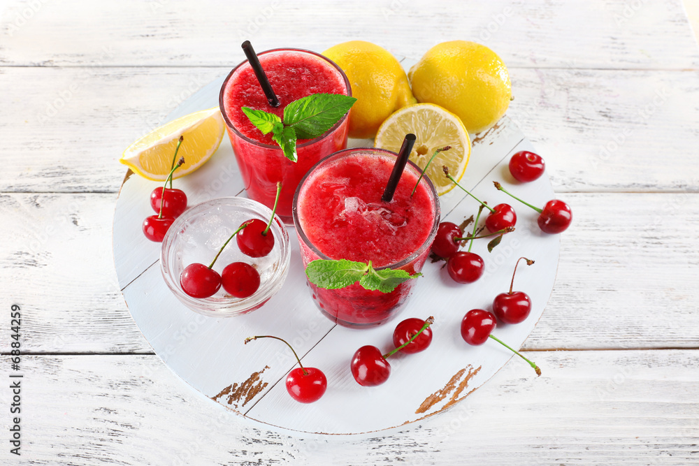 Fresh cold cherry cocktail with mint and lemon