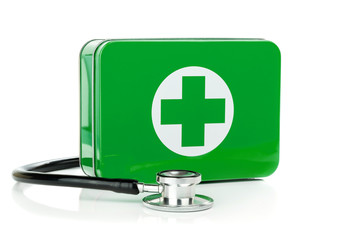 First aid box and stethoscope on a white background