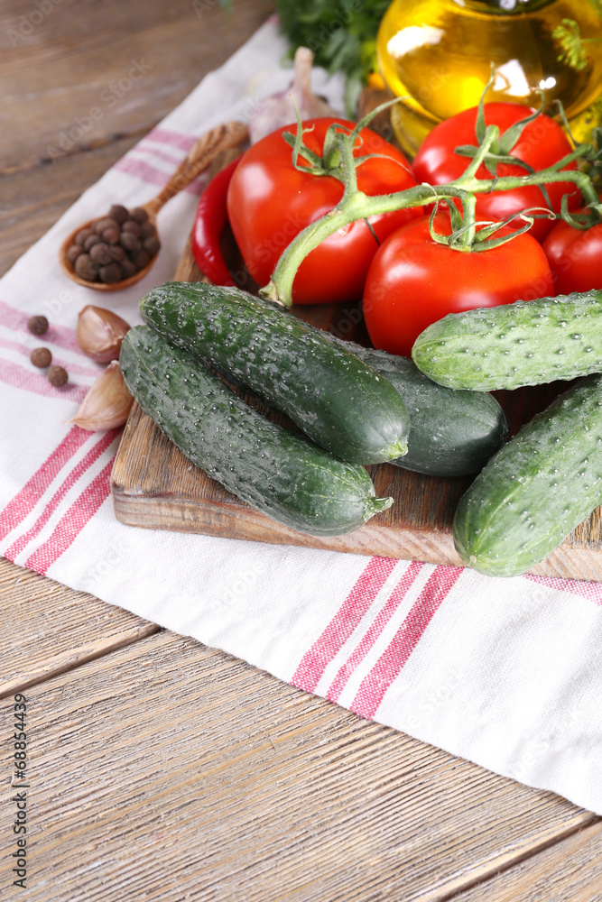 Fresh vegetables with herbs and spices on table, close-up