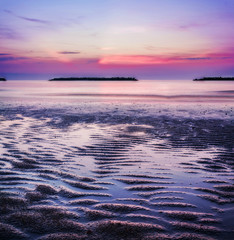 Sunrise by the sea in an italian beach