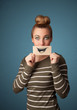 © ra2 studio - Happy cute girl holding paper with funny smiley drawing