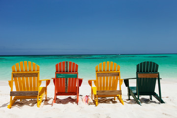 Poster - Colorful chairs on Caribbean beach