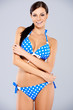 © Dash - Sexy brunette posing in blue swimsuit