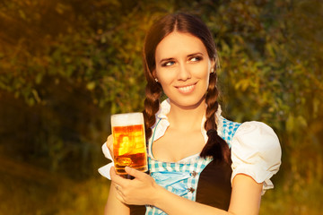 Wall Mural - Young Bavarian Woman Holding Beer Tankard