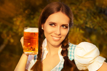 Wall Mural - Young Bavarian Woman Holding Beer Tankard