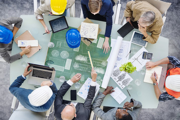Wall Mural - Architects Planning Around the Conference Table