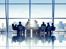 Silhouette Of Business Person In A Board Room