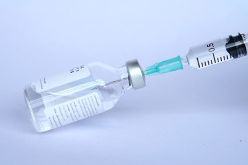 Vaccine and syringe