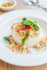 Canvas Print - Spicy fried chicken with basil and rice