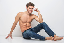 Handsome Guy In Jeans With Bare Torso.